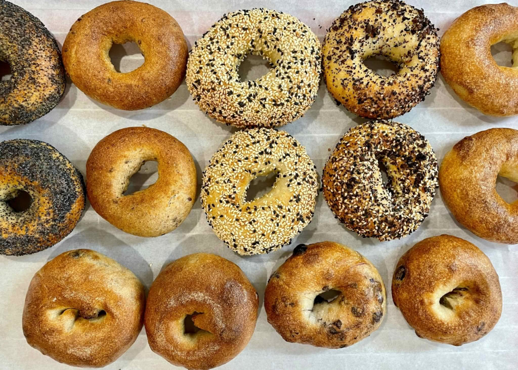 Freshly baked bagels with assorted toppings and flavors for breakfast or brunch.