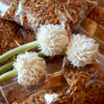 Delicious shredded pulled pork packaged for cooking, ideal for barbecue recipes.