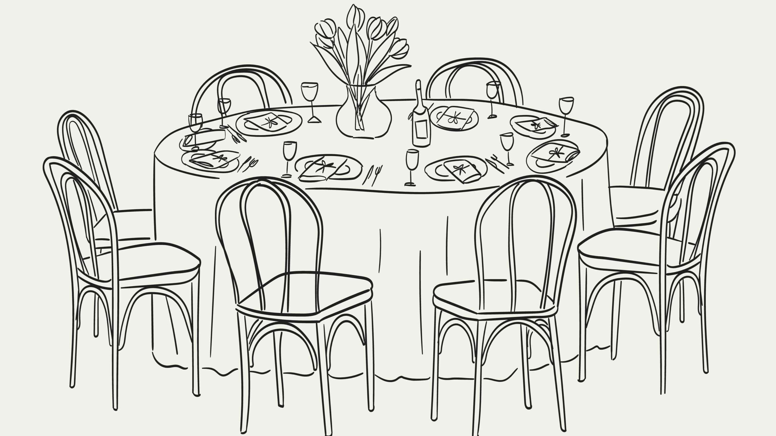 Elegant dining table with tulip centerpiece, set for seven guests, perfect for gatherings.
