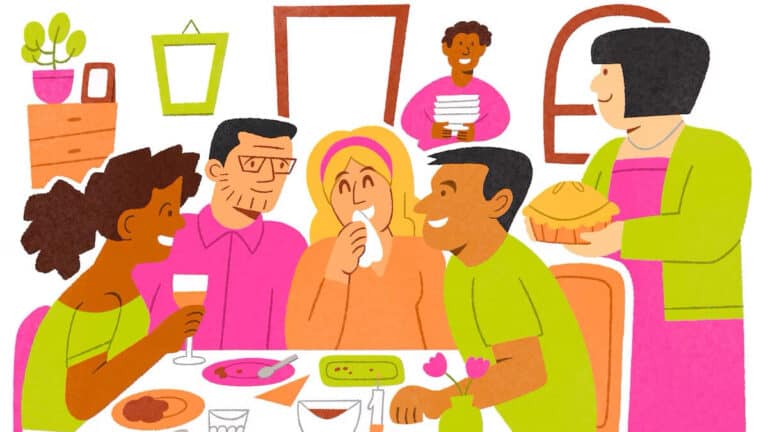 Friendly group enjoying dinner together at a cozy gathering.