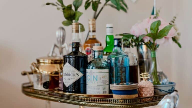 Home bar with various liquor bottles and glassware for entertaining.