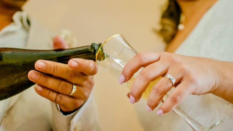 Celebratory toast being poured during an elegant dinner event, highlighting the art of after-dinner.
