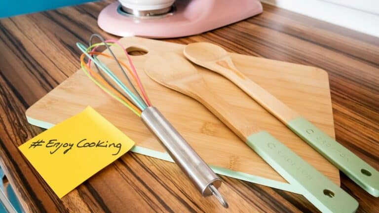 Efficient kitchen tools including wooden spoons, spatulas, and a whisk for easier meal prep.