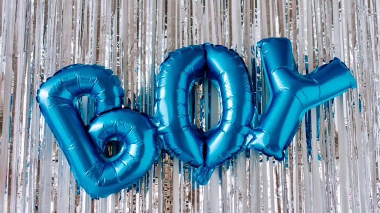 Bright blue "LOVE" balloons for baby shower celebration.