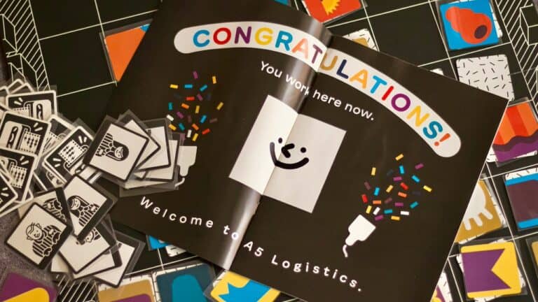 Celebration card with 'Congratulations' and a smiling face at a retirement party.