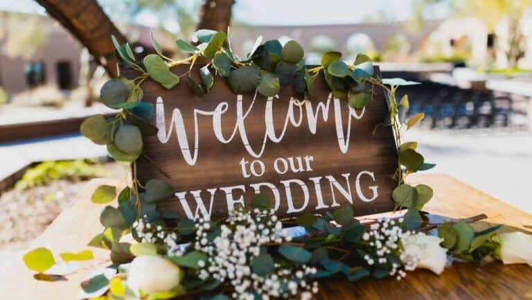 Welcome to our wedding sign with greenery and flowers for wedding decor.