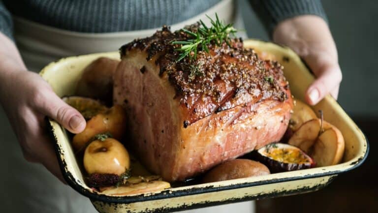 Juicy roasted beef tenderloin with herbs and roasted vegetables.
