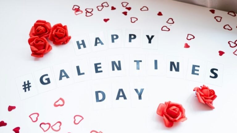 Happy Galentine's Day message with red roses and heart confetti.