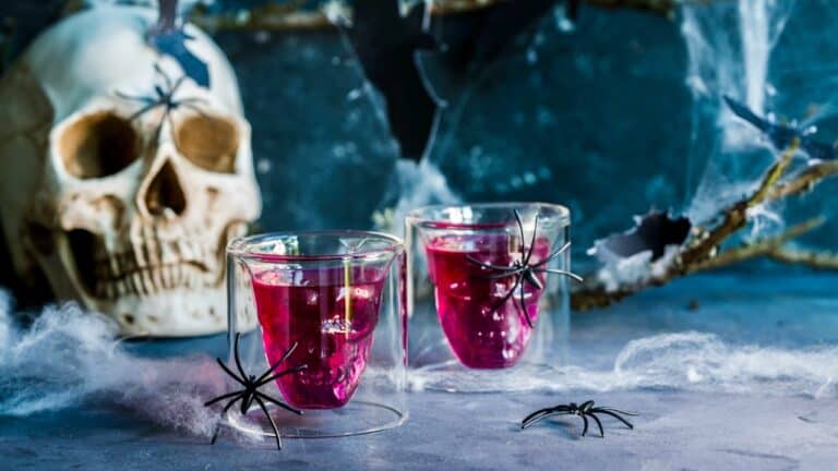 Spooky Halloween drinks with skull and spiders for a party.