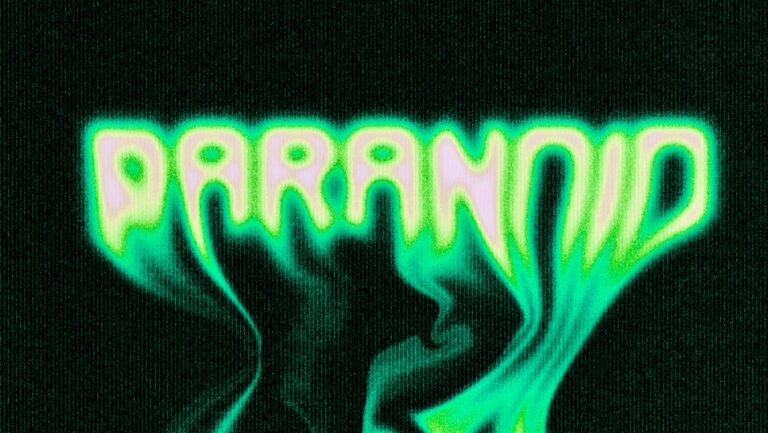 Paranoid neon sign with green and purple glow on dark background.